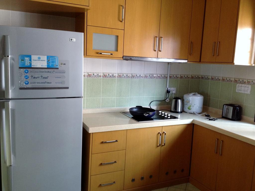 Homestay Marina Court كوتا كينابالو الغرفة الصورة